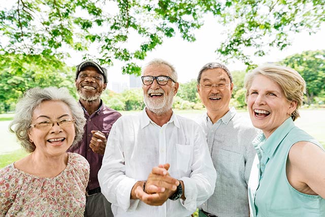 sts-seniors A group of smiling senior citizens.