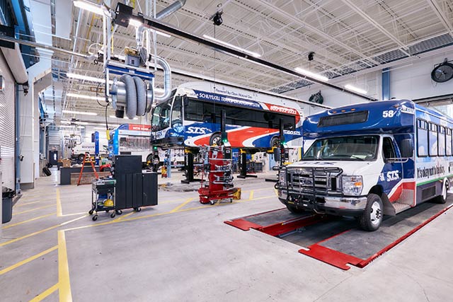 Vehicles in the STS repair shop.