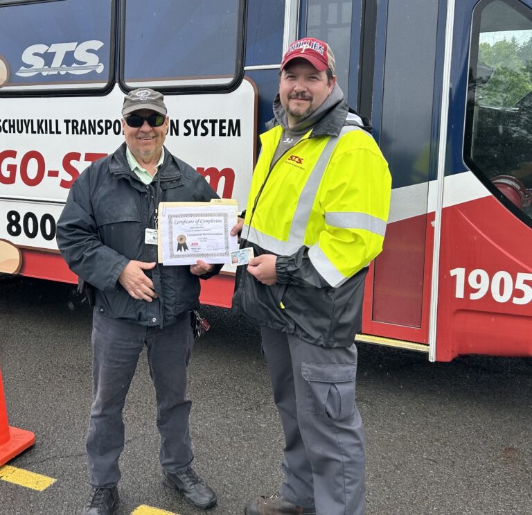 Carl Skroback receives his training certificate.
